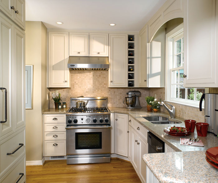 Small kitchen design with off white cabinets by Decora Cabinetry