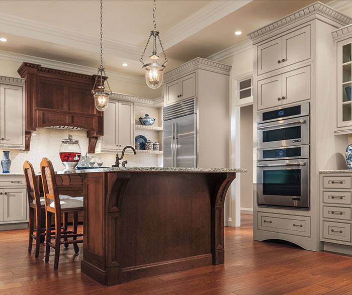 Painted Maple cabinets with a Cherry kitchen island by Decora Cabinetry